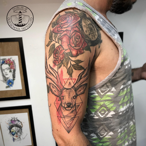 stag on arm tattoo